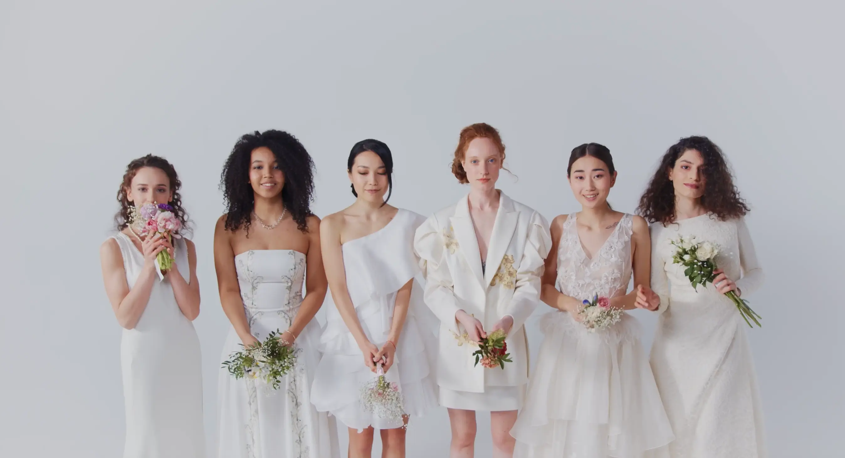 Line up of girls throwing flowers